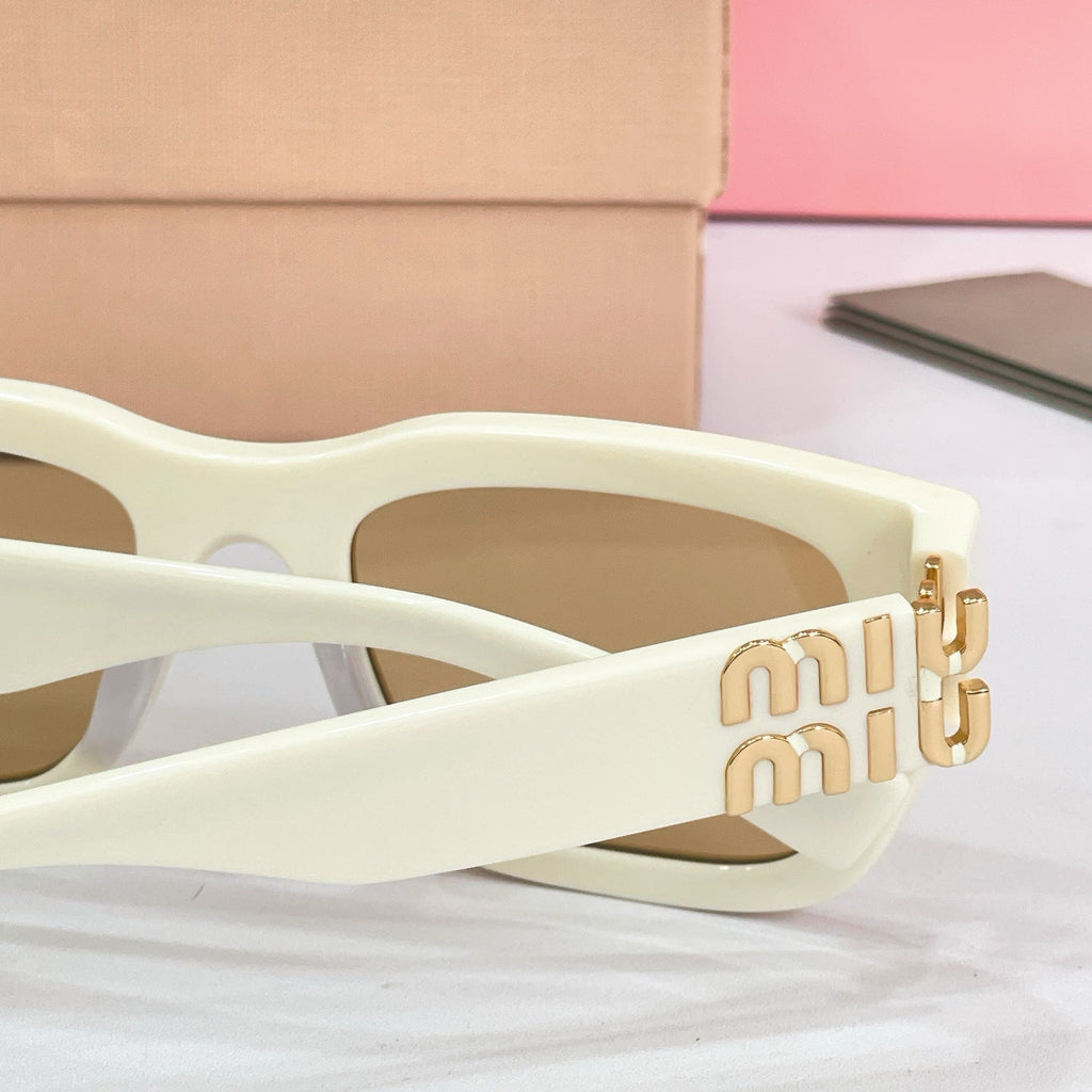 Miu Miu Sunglasses – MU C04S