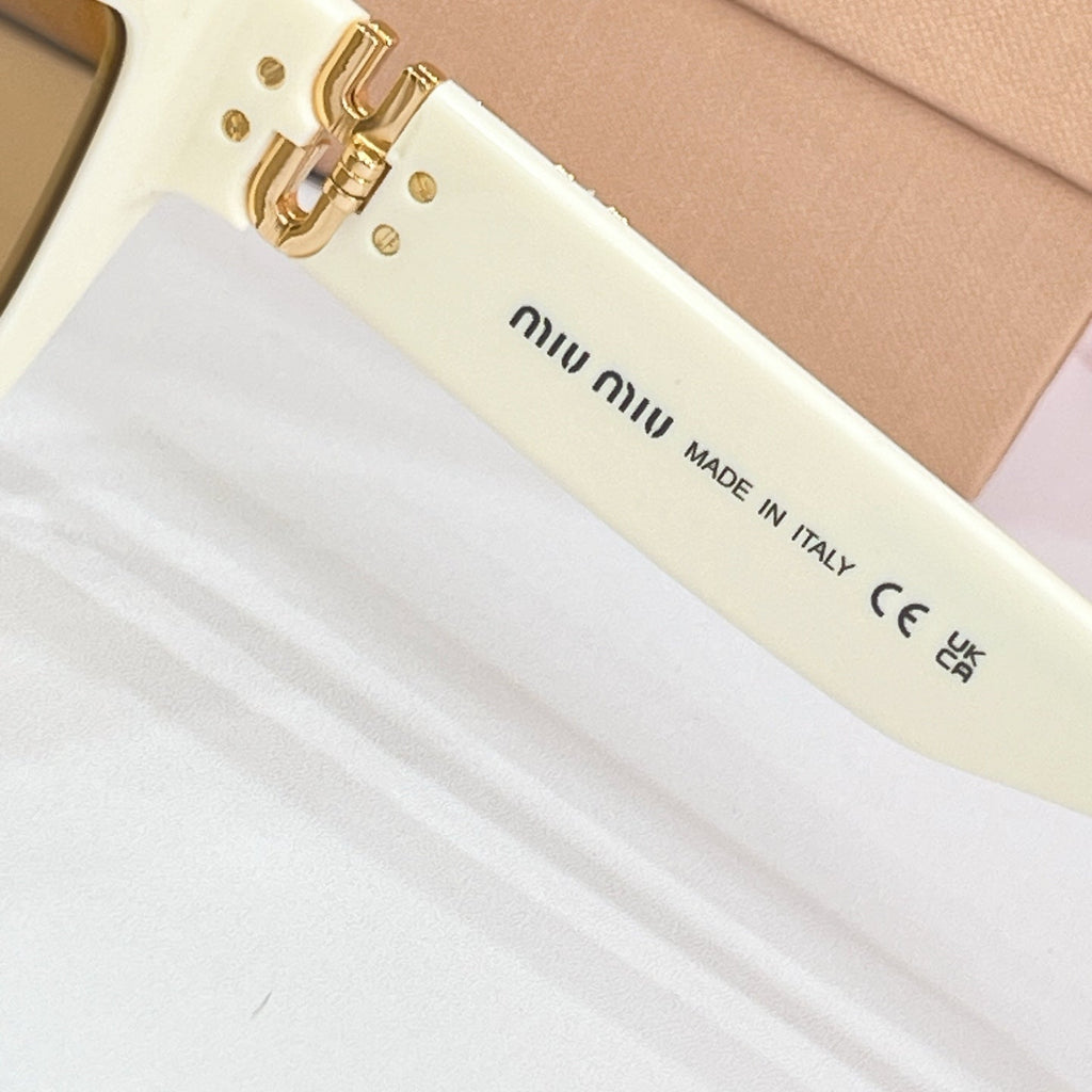 Miu Miu Sunglasses – MU C04S