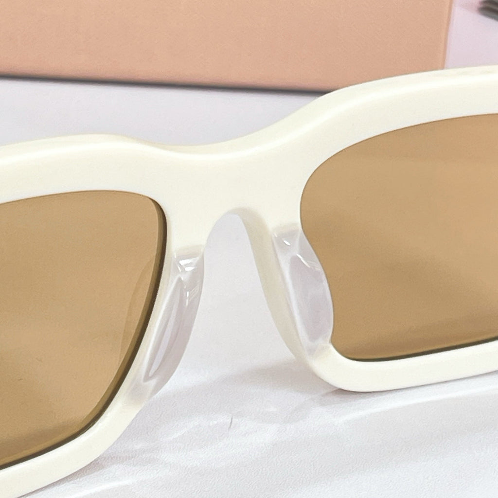 Miu Miu Sunglasses – MU C04S